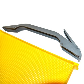 Keretfogó műanyag keretek kivételéhez